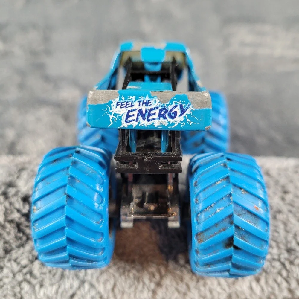 Hot Wheels Monster Jam Blue Thunder and NEA Police 1:64 Diecast Truck Lot of 2